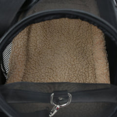 Soft padded interior of leather pet carrier for cats

